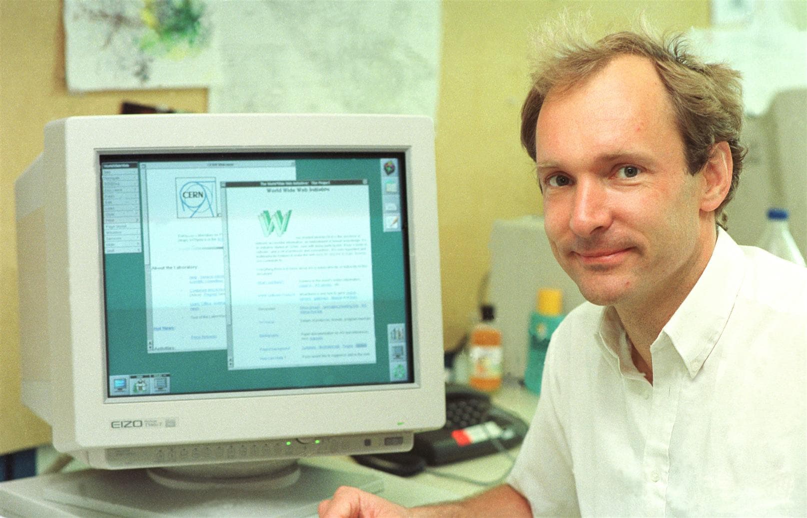 Tim Berners-Lee beside an early web workstation at CERN
